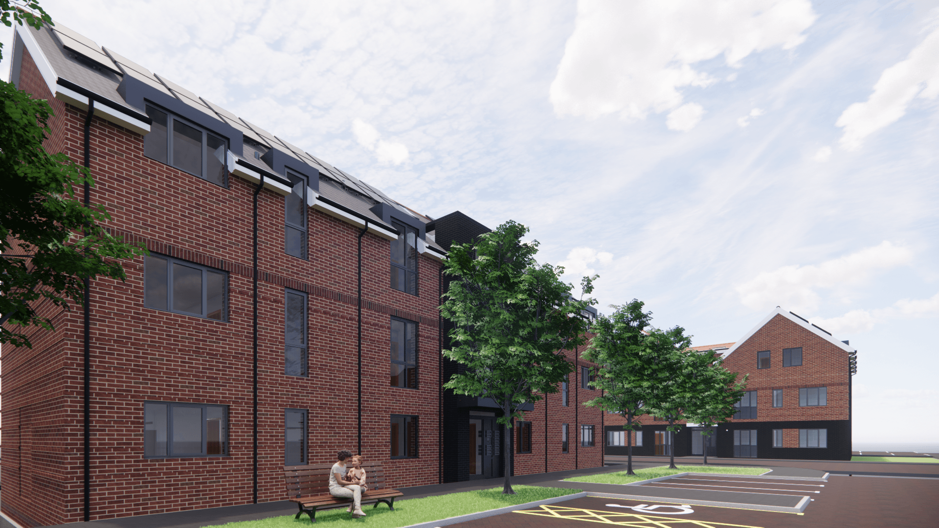 St Peter's (Greenlands and Silverlands), Chertsey: design-stage render of a three-storey red-brick apartment block with PV-clad pitched roof, set against a smaller red-brick block across a tarmac courtyard with a bench, lawn and street trees in the foreground